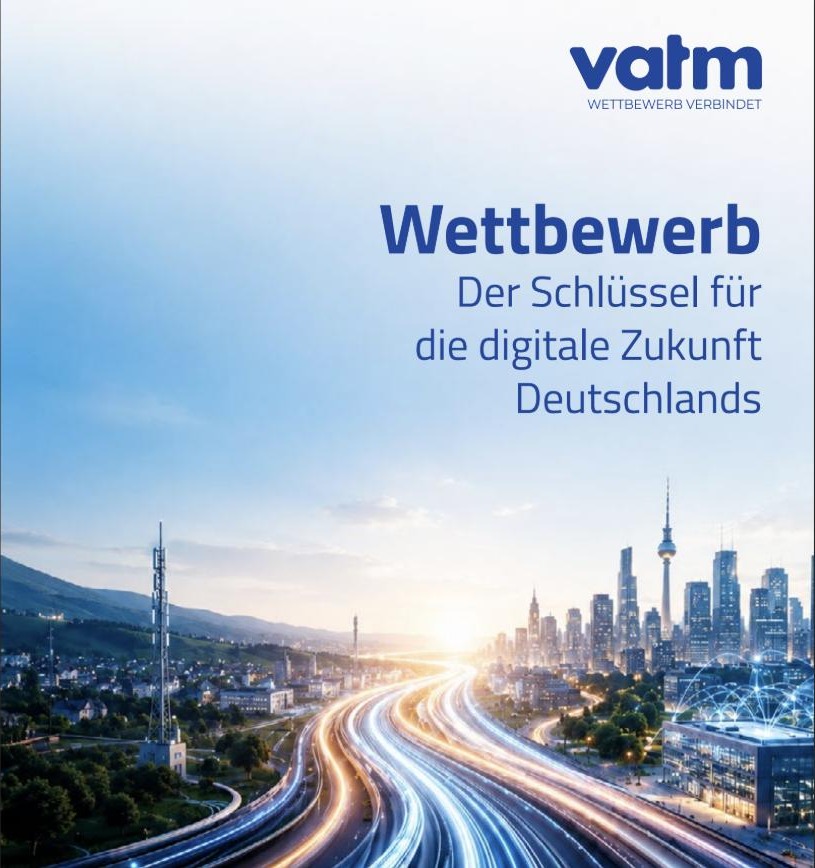 Blue-tinted city skyline with illuminated highways at dusk; VATM logo and slogan: 'Wettbewerb – Der Schlüssel für die digitale Zukunft Deutschlands'.